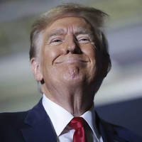 Close-up of Donald Trump's face with a slight smile