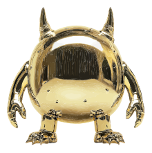 A golden robot figurine with a round body and two horns.