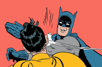 Batman using a grappling hook to capture a suspect