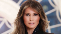Melania Trump in a black collared shirt