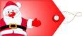 Santa Claus standing beside a large red gift tag