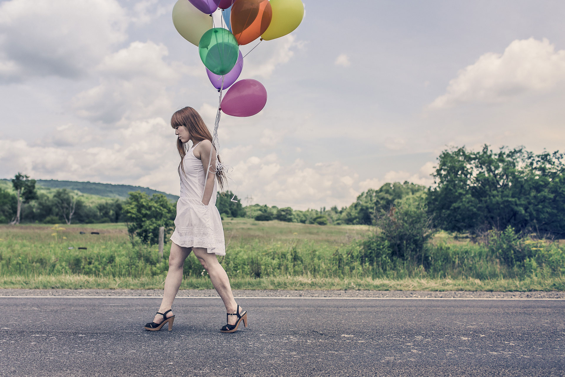 Preview for Woman-walking-with-balloons-apparel-background-66e98