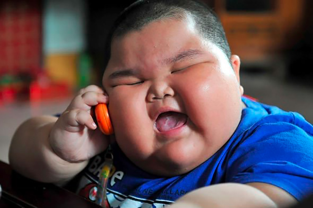 Preview for Child-with-down-syndrome-on-phone-baby-background-4dfee