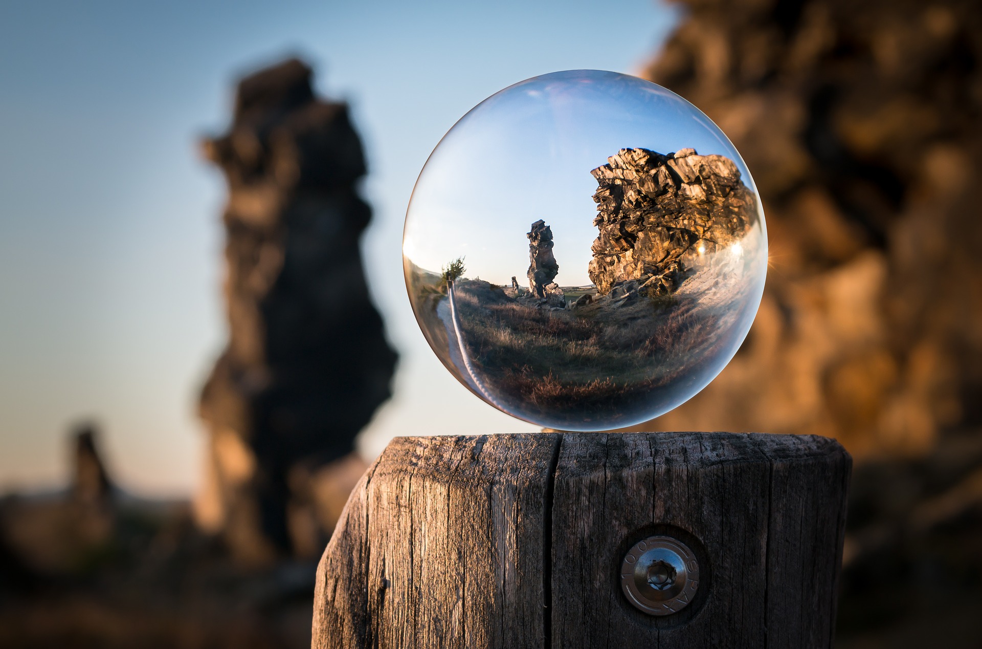 Preview for Crystal-ball-rocky-landscape-reflection-human-background-57d9a