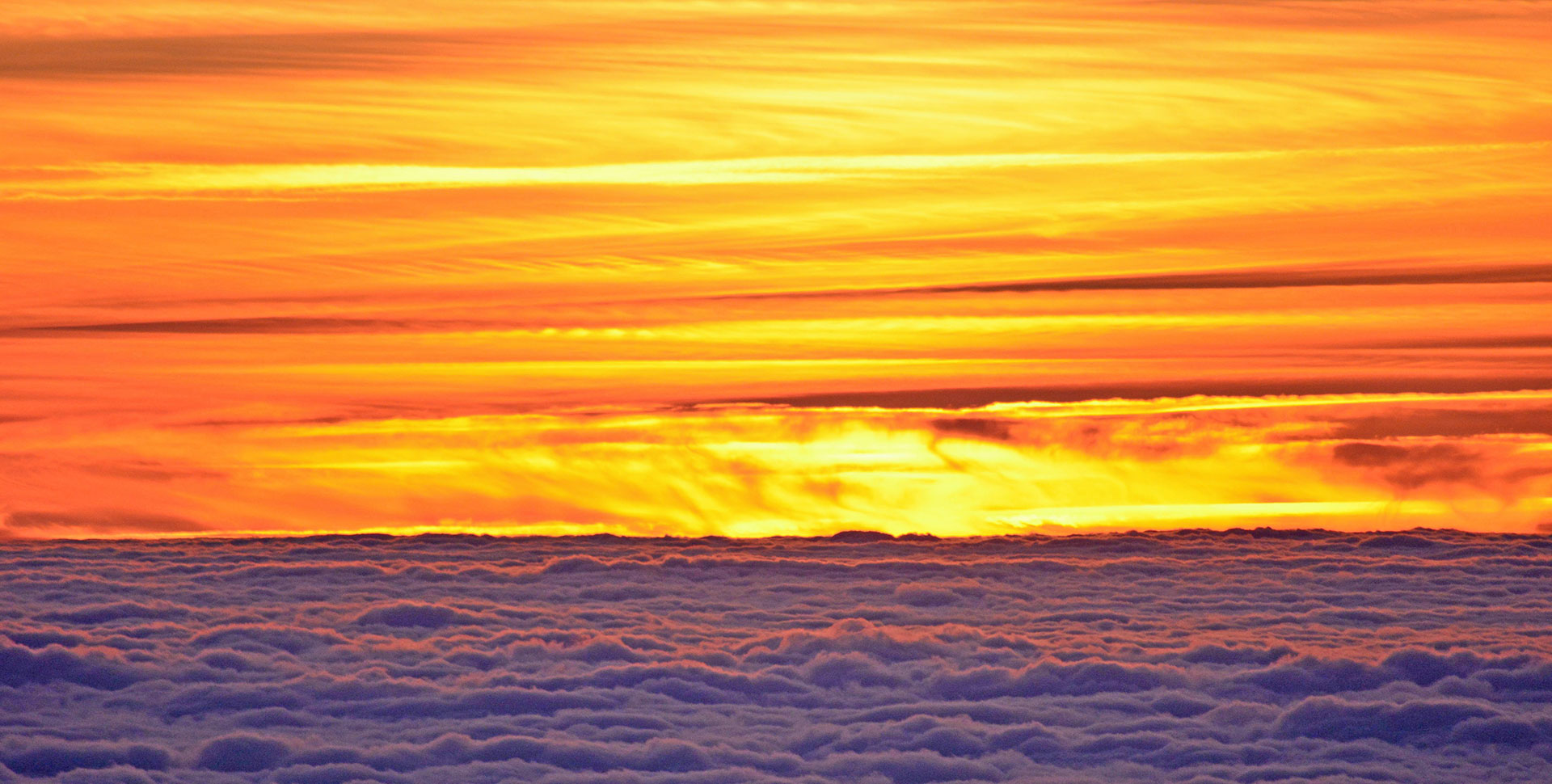 Preview for Vibrant-sunset-above-clouds-horizon-background-525ab
