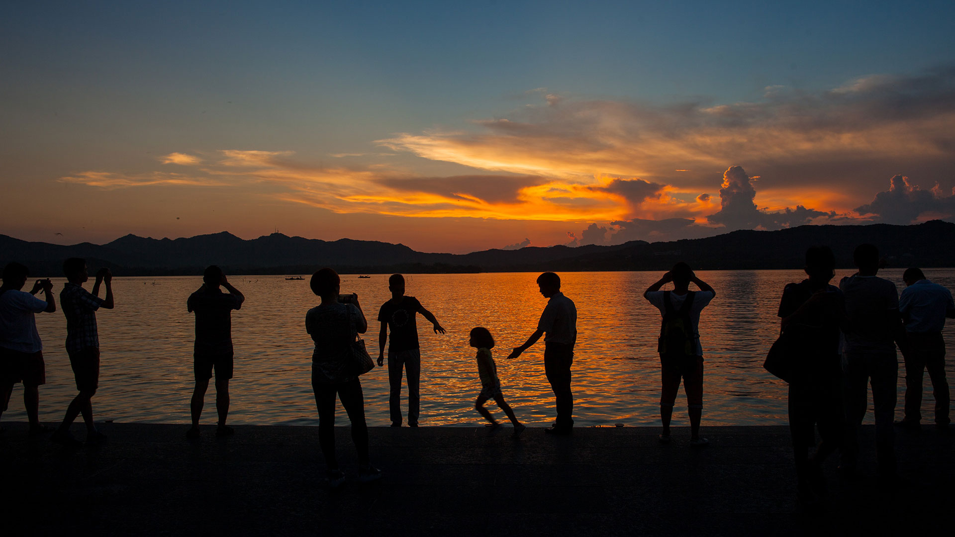 Preview for Serene-sunset-waterfront-gathering-family-background-42262