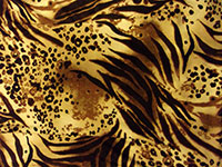 Tiger pattern with black stripes and spots on yellow