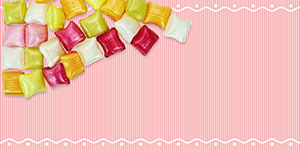 Colorful wrappers on a pink background