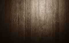 Dark wooden planks with a textured surface
