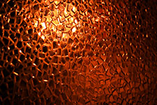 Mosaic glass lamp with warm orange light
